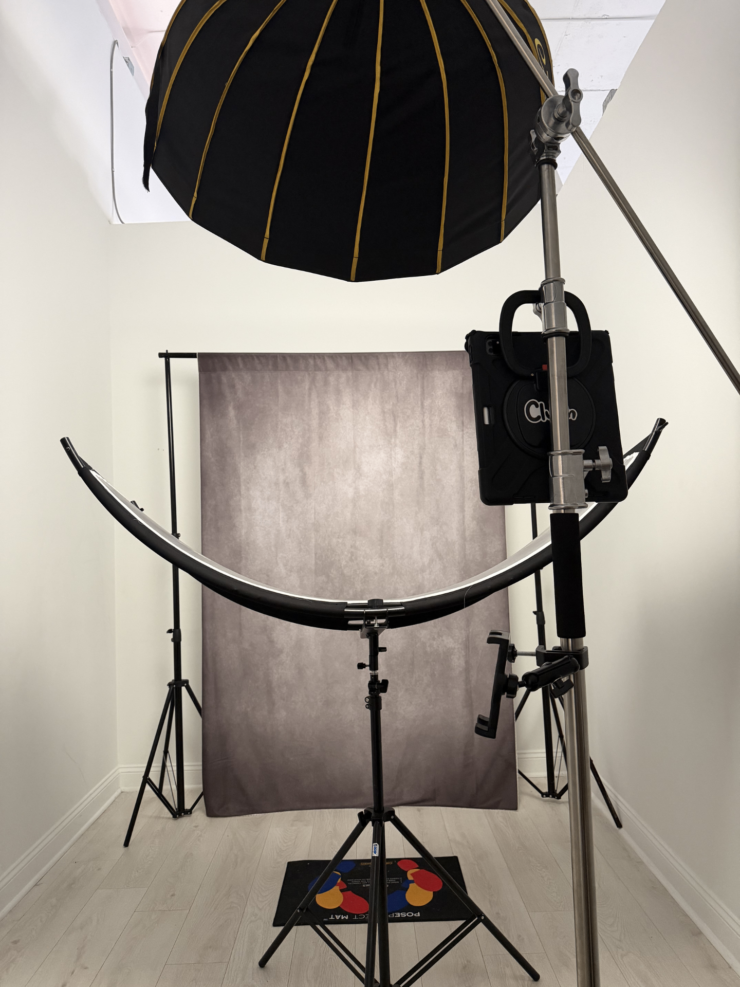 Behind-the-scenes view of the Headshot Haven studio setup with softbox lighting and backdrop
